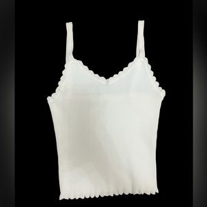 white tank top with some ruffles